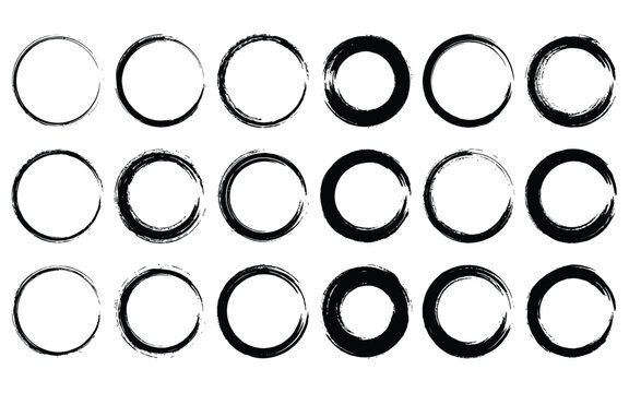 Set of distressed ink brush circle frames and hand drawn round border elements for artistic design.