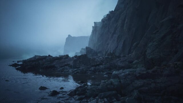 wet rocky shore under heavy fog, scattered boulders and tidal pools, distant ruined tower on cliff, pale blue light pooling in hollows, quiet lonely mood ideal
