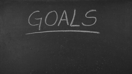 Goals text on blackboard © Predrag