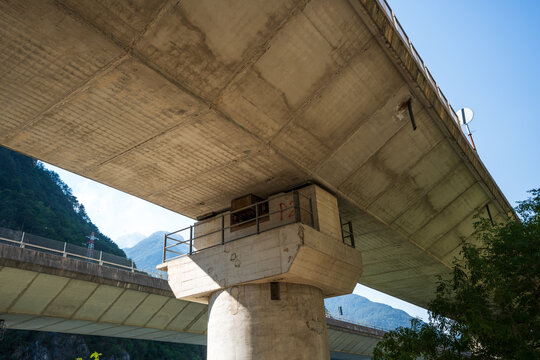 reinforced concrete road infrastructure characterised by imposing pylons and box-girder decks, known for the complex history of concrete degradation
