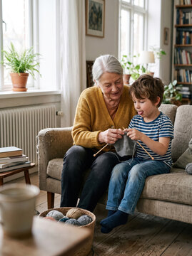 Grandmother Teaching a Child to Knit