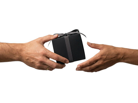 Two hands exchanging black gift box, transparent background