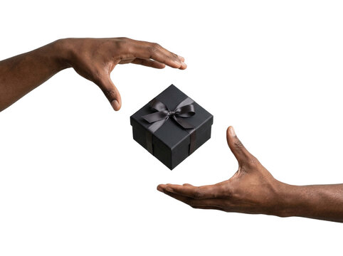 Black hands reaching for a black gift box, transparent background
