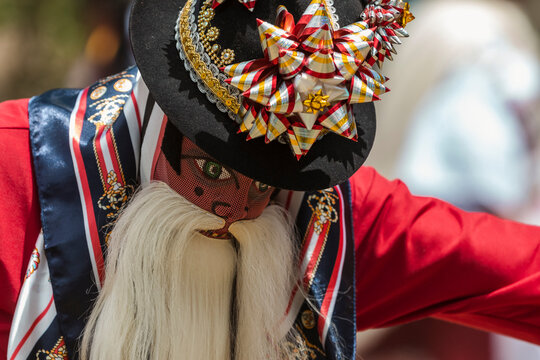 Chivo character in traditional attire performing at the cultural festival of Zuleta, Ecuador