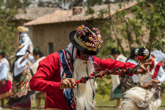Chivo character in traditional attire performing at the cultural festival of Zuleta, Ecuador