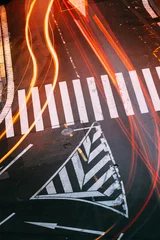 Abstract zebra crossing with red light trails © Great Brut Here