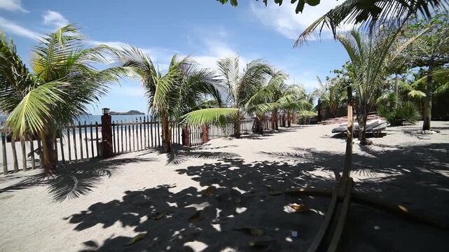 palm trees on the beach, resort sunset on the beach, resort in Philippines beach sunset, pundakit zambales, boats at seashore, ocean sunset resort in Asia, tropical resort
