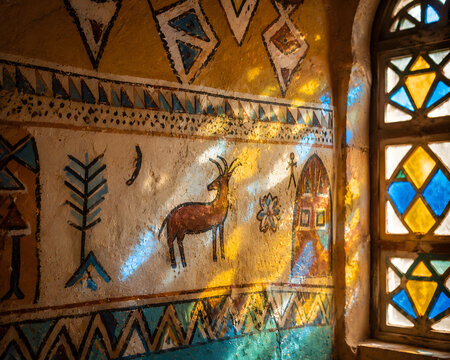 Nubian Wall Art Lit By Colorful Stained Glass Light