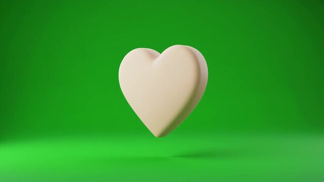 Minimal realistic 3D heart symbol gently floating and rotating on chroma key green, representing ecommerce wishlist, favorite products, online shopping preferences and retail engagement.