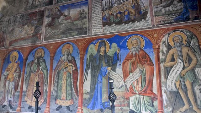 Religious frescoes decorating an orthodox church wall