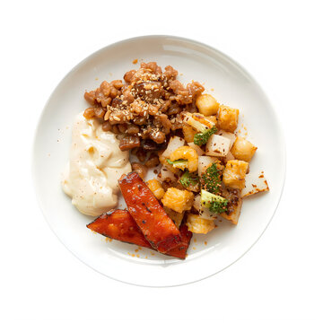 Close-up of mixed vegetable and meat dish on plate