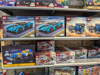 Fototapeta premium MONTREAL, CANADA, 22 December 2025 : Lego Technic and Speed Champions Sets on Store Shelf