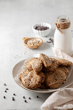 A plate of freshly made chocolate chip quinoa cookies, ready for eating. 