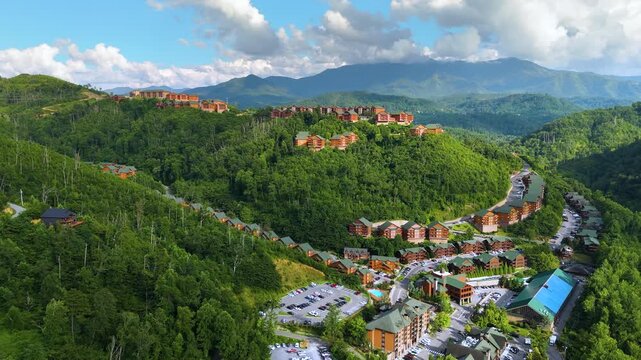 Scenic mountain homes in the Appalachian region of Tennessee with lush woodland, rolling hills and tranquil summer landscape