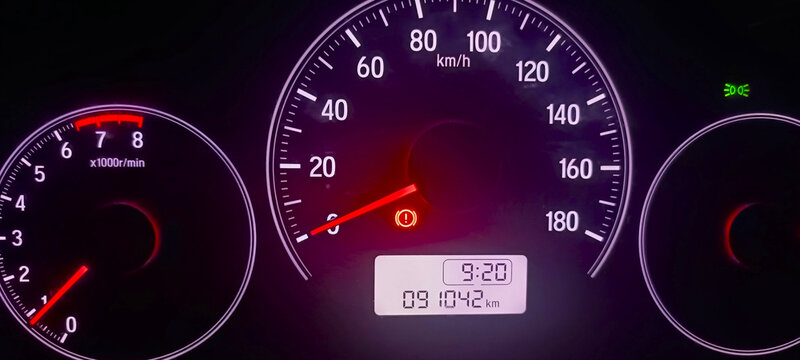 speedometer on black background