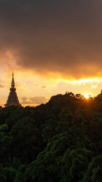 Time lapse of the sunset behind mountain peak in Chiangmai, Thailand.