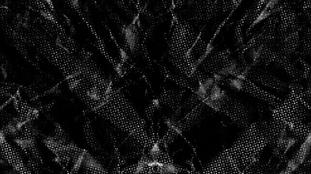 Dark Halftone Paper Stop Motion.Animated black and white crumpled paper texture with halftone dot video effect.