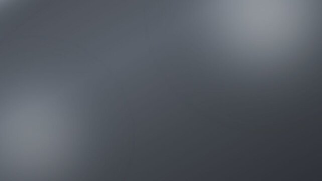 Dark grey gradient background with soft light flares. 4K Video