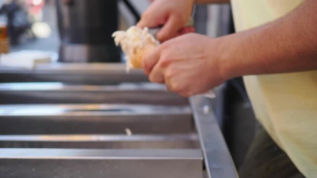 Ice cream being served at a street stand in summer