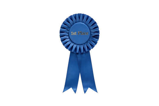 A blue rosette ribbon with the text 1st place printed in the center, featuring pleated fabric and two hanging tails on a white background