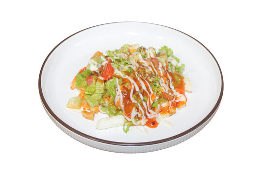 Fresh Vegetable Salad With Mayonnaise And Chili Sauce Drizzle