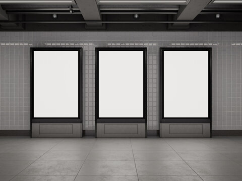 Three blank posters in modern subway station mockup for advertising