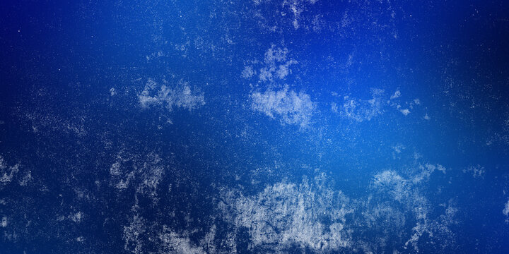 Deep blue celestial background with luminous center and icy distressed textures perfect for winter holiday greeting cards and professional corporate branding website backgrounds.