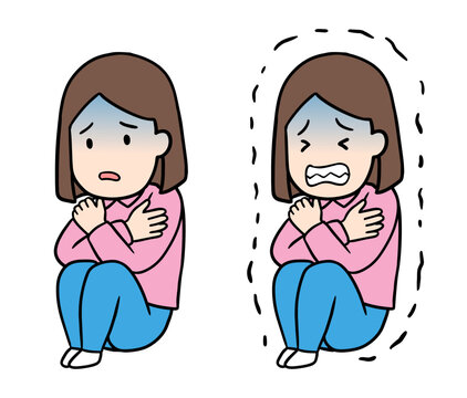 体調不良や寒さで体育座りをして青ざめて震える女性