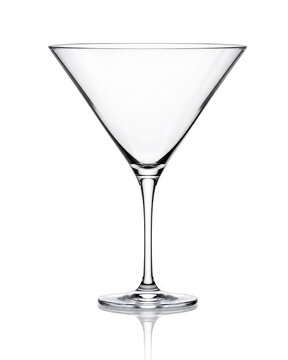 Empty martini glass with slender stem and triangular bowl as isolated on transparent background