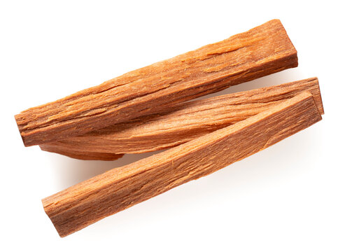 Red sandalwood sticks isolated on white background, top view.
