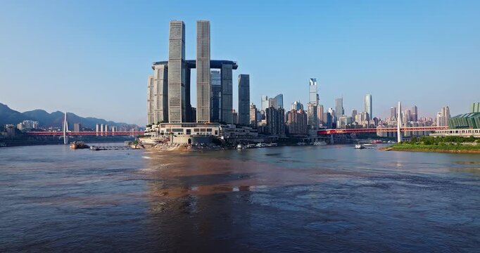 Modern skyscrapers and city skyline at the Chaotianmen confluence of the Jialing and Yangtze rivers in Chongqing, China