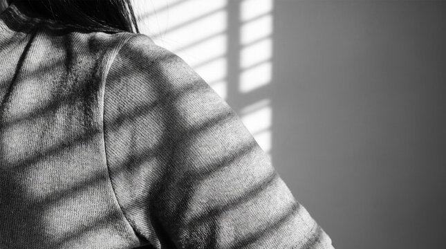 Black and White Geometric Striped Window Blind Shadows on Ribbed Knit Sweater