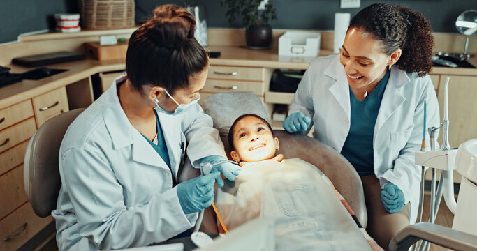 Assistant, tools and dentist with kid in clinic for teeth cleaning, assessment or checkup. Oral hygiene, consultation and orthodontic team with girl child for tooth extraction for dental health.