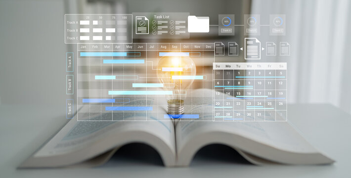 An open book illuminated by a light bulb symbolizes inspiration, surrounded by a digital interface, representing modern task management and productivity in a workspace. Gantry