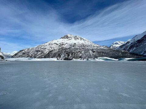 Mountain behind frozen lake