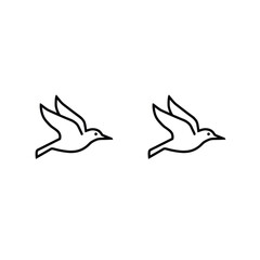 Obraz premium 白い背景に飛んでいる2羽の鳥のシンプルなライン