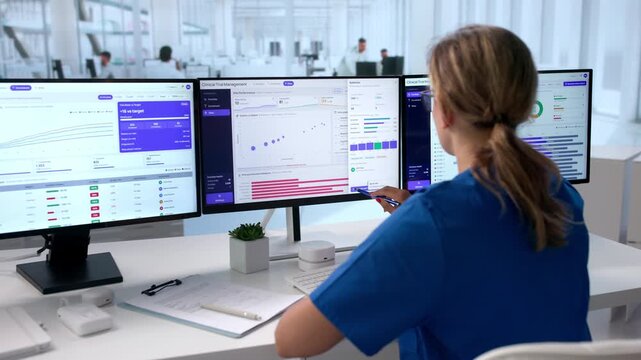 Clinical Trial Manager Reviews Patient Enrollment Data