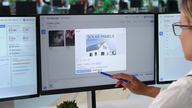 Marketing Manager Analyzes Ad Campaign Data On Computer