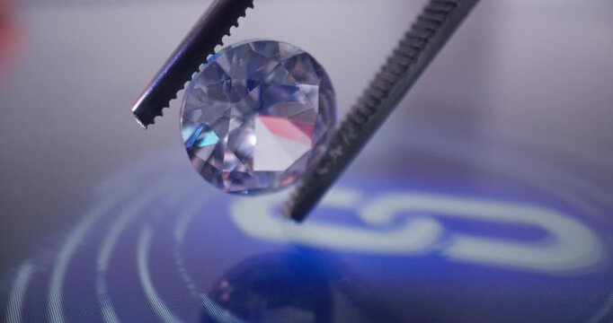 Diamonds resting on digital blockchain certificate display.