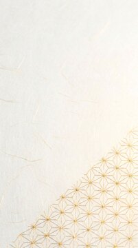 Vertical view of natural off-white Washi paper texture with fine metallic gold Asanoha pattern
