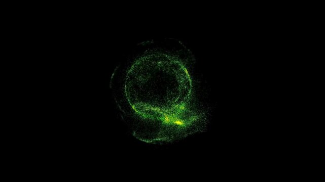 Abstract green and yellow particle explosion on black background