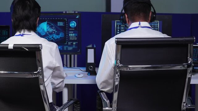 Air traffic controller monitors flight radar screens in a modern dark command center, aviation technology, flight safety, surveillance and precision.