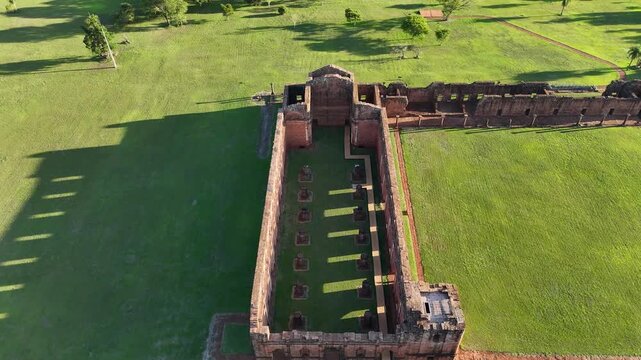 Aerial top-down view of the main church nave and pillar foundations at the historic Jesuit Missions ruins in Paraguay.