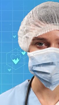 Animation of medical icons and caucasian female doctor with face mask on blue background
