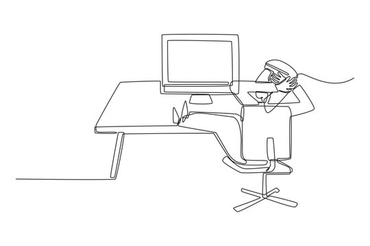 A single line drawing of a human young man working as an Arab businessman relaxing with feet on his office desk and hands behind head, viewing a computer monitor from the back in a modern workspace.