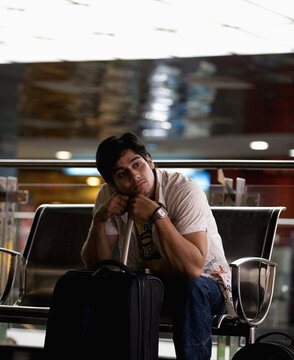 Sitting with luggage 