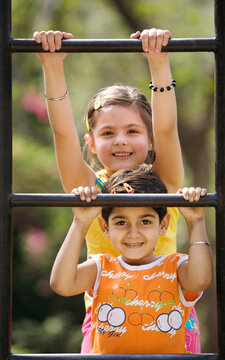 Children on monkey bars 