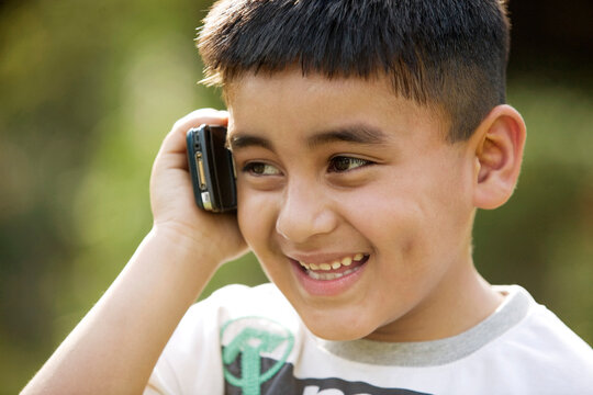 Boy talking on a phone 