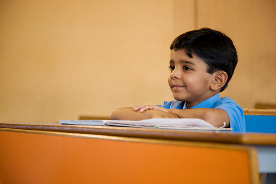 School boy at his desk 