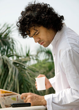 Man reading the newspaper 